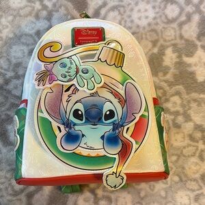 LOUNGEFLY. Disney Stitch and Scrump Colorful Backpack. NEW WITH TAGS